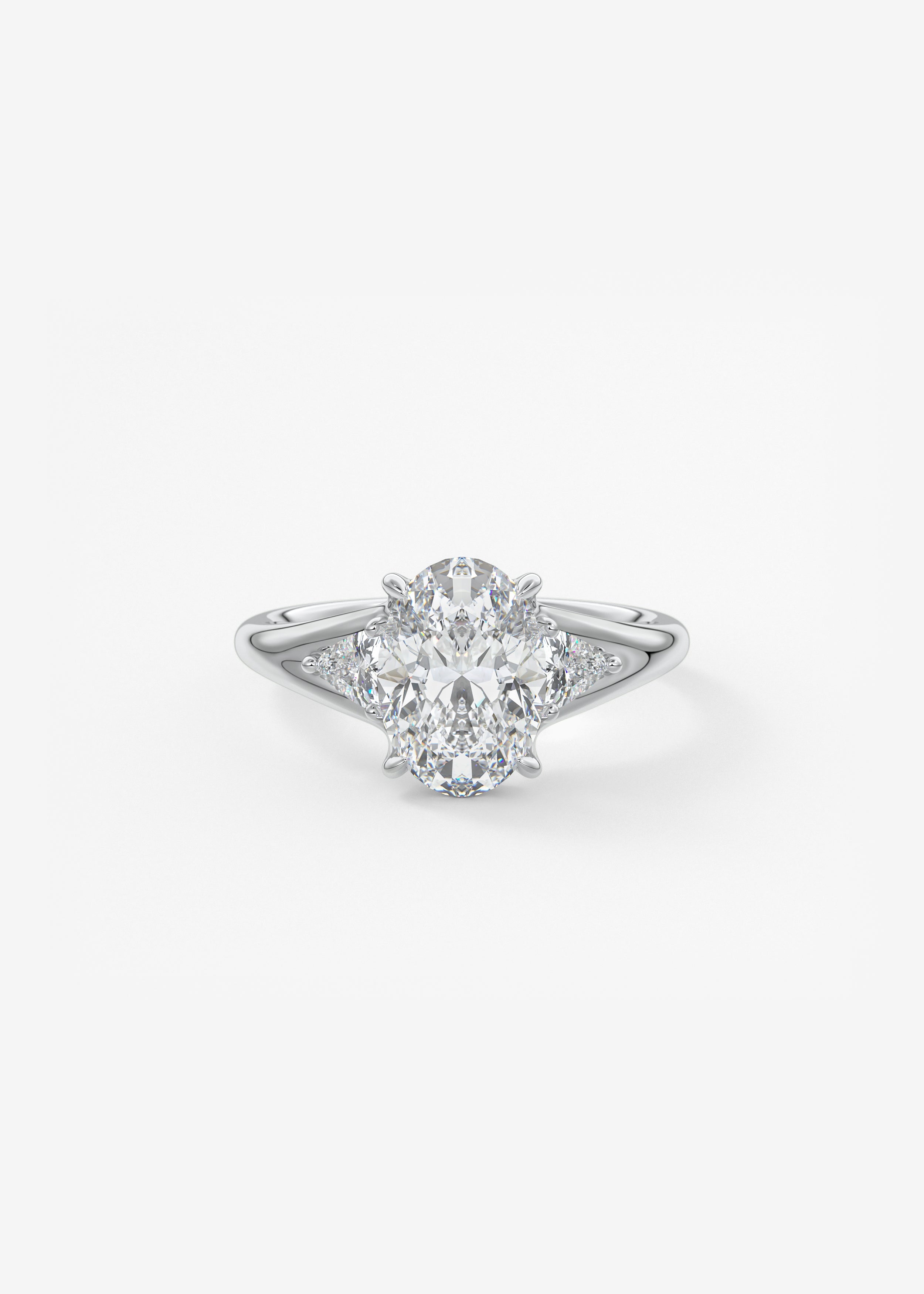 The 幸运飞行168(官方开奖)体彩网|168开奖 Symphony engagement in WG metal featuring Oval cut with Three_Stone,Prong,Split_Shank setting