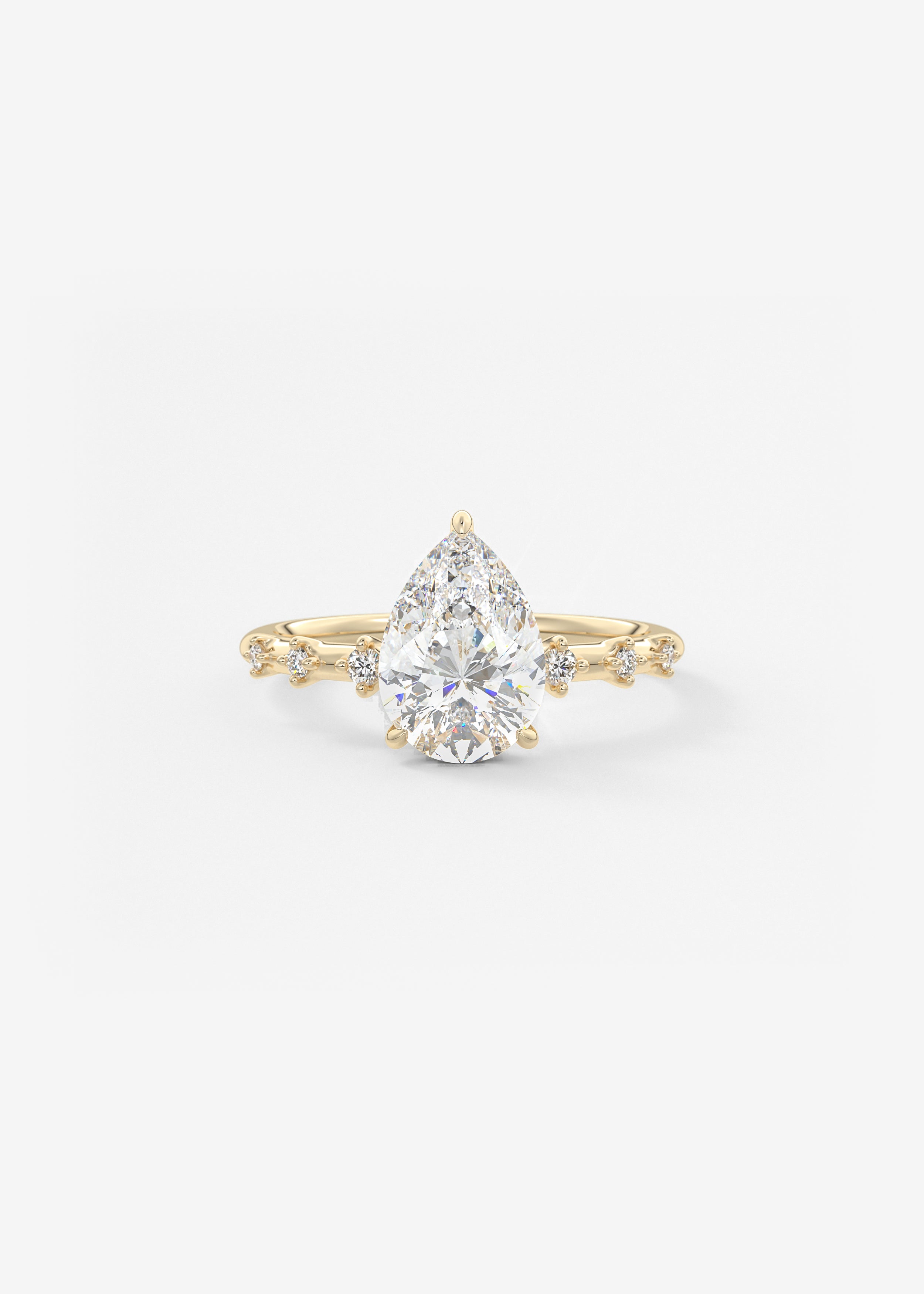 The Starlette  engagement in YG metal featuring Pear cut with Prong,Diamond Details setting
