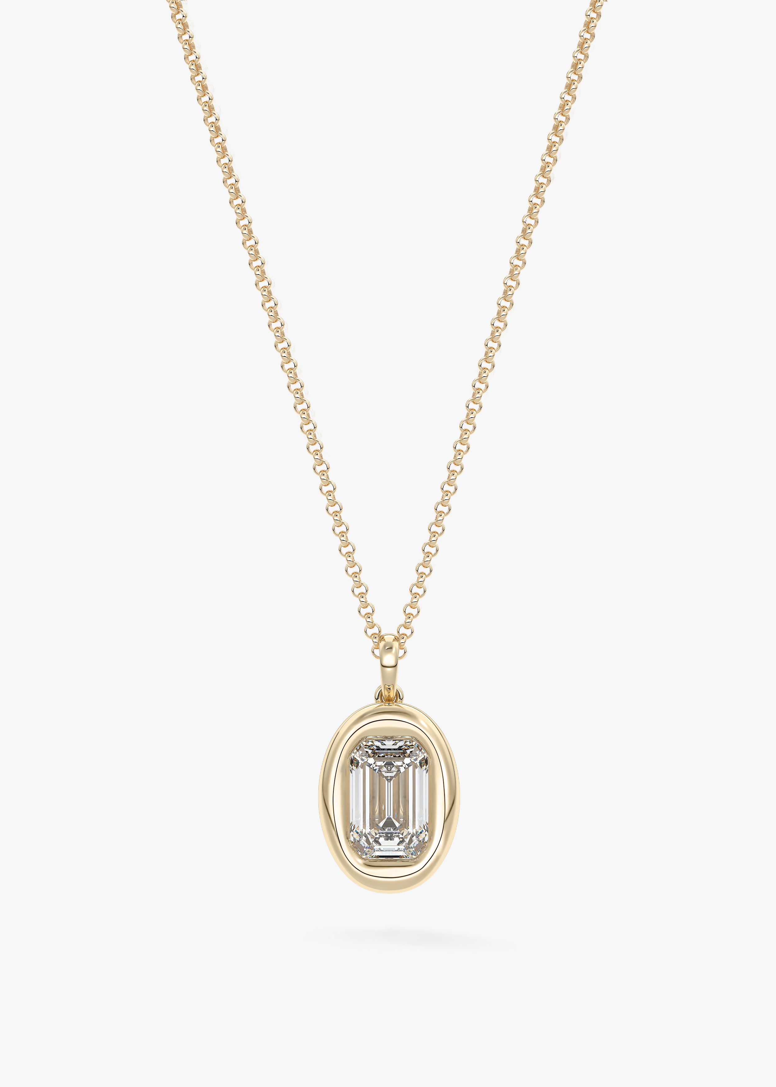 The Gumdrop  necklace in YG metal featuring Emerald cut with Bezel,Emerald setting