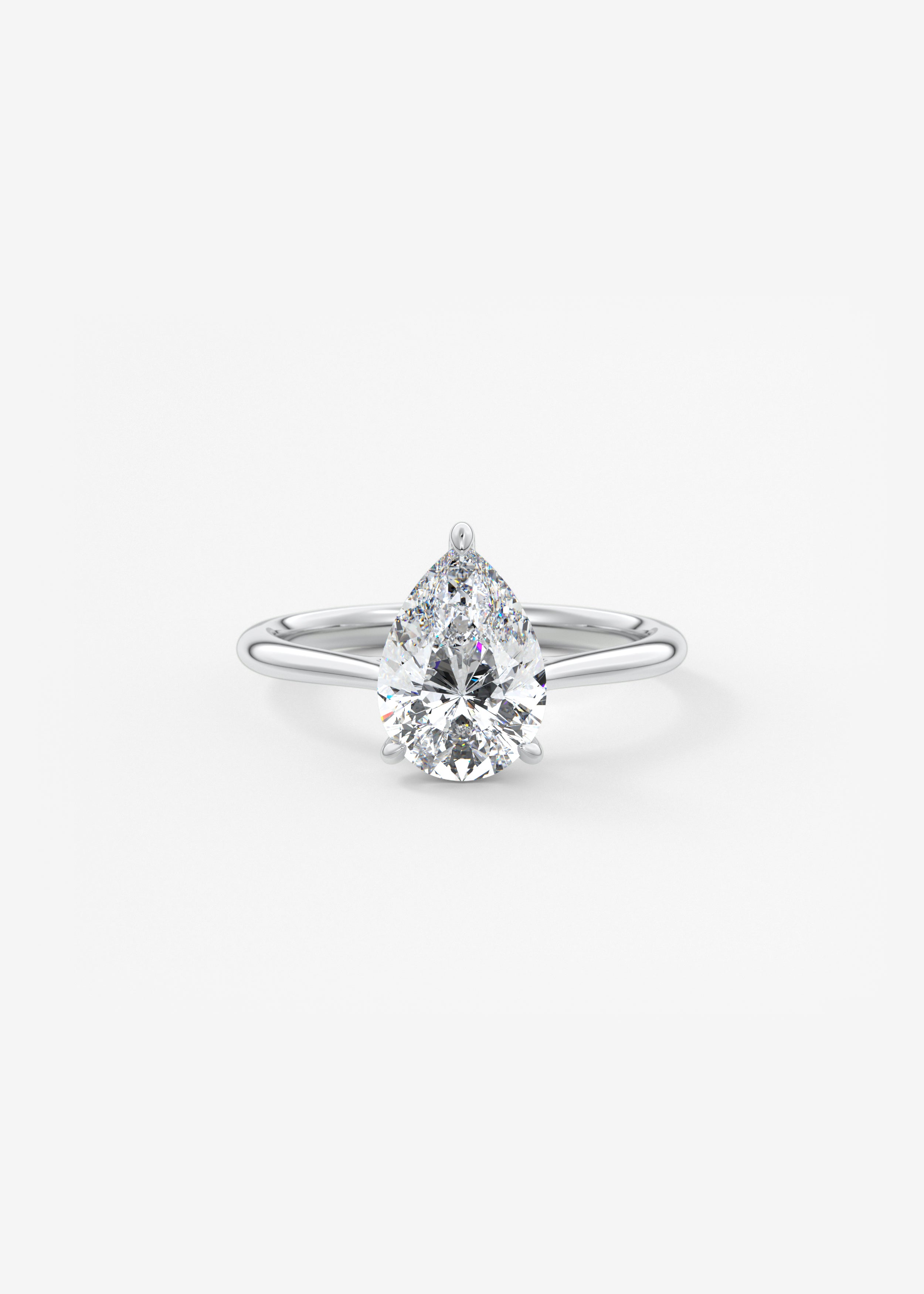 The Cathedral Hidden Halo  engagement in WG metal featuring Pear cut with Solitaire,Prong,Hidden Halo,Cathedral setting