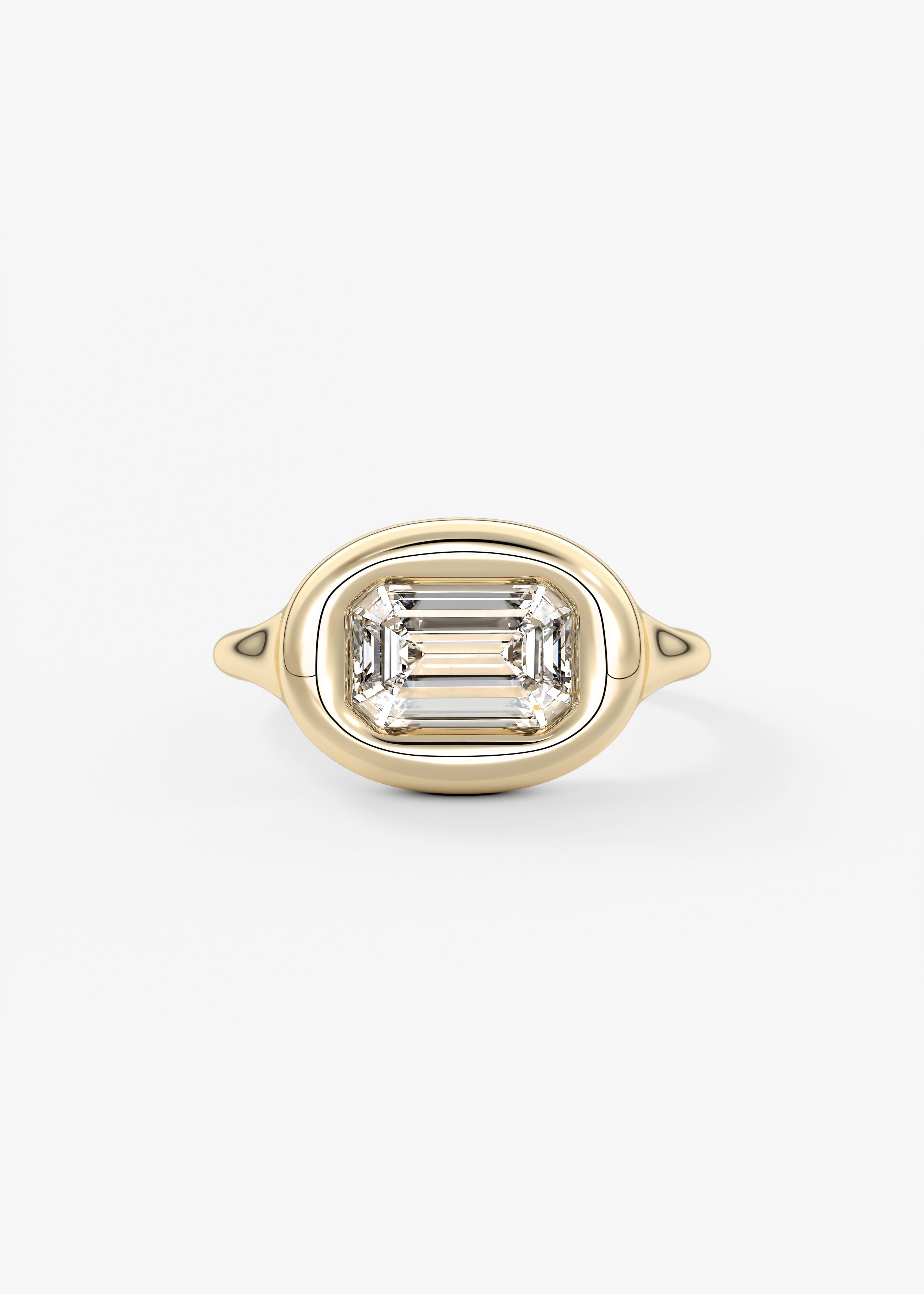 The Gumdrop  engagement in YG metal featuring Emerald,Radiant cut with Solitaire,Bezel,Chunky setting