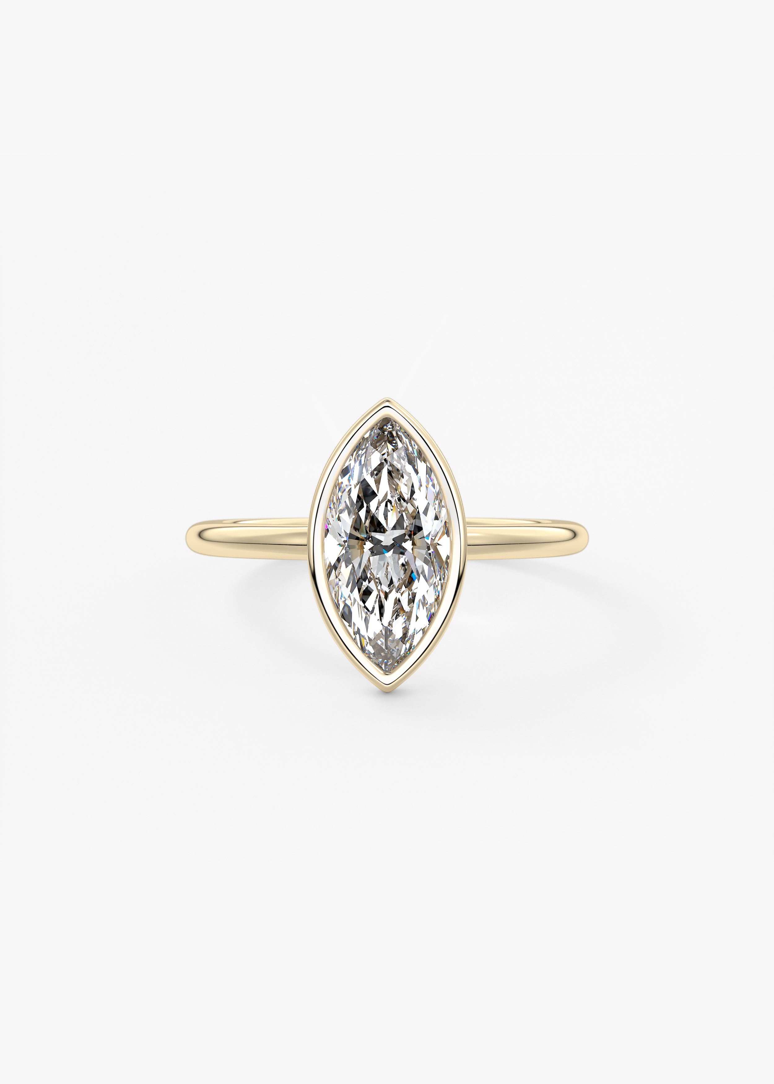 The Daily Bezel  engagement in YG metal featuring Marquise cut with Solitaire,Bezel setting