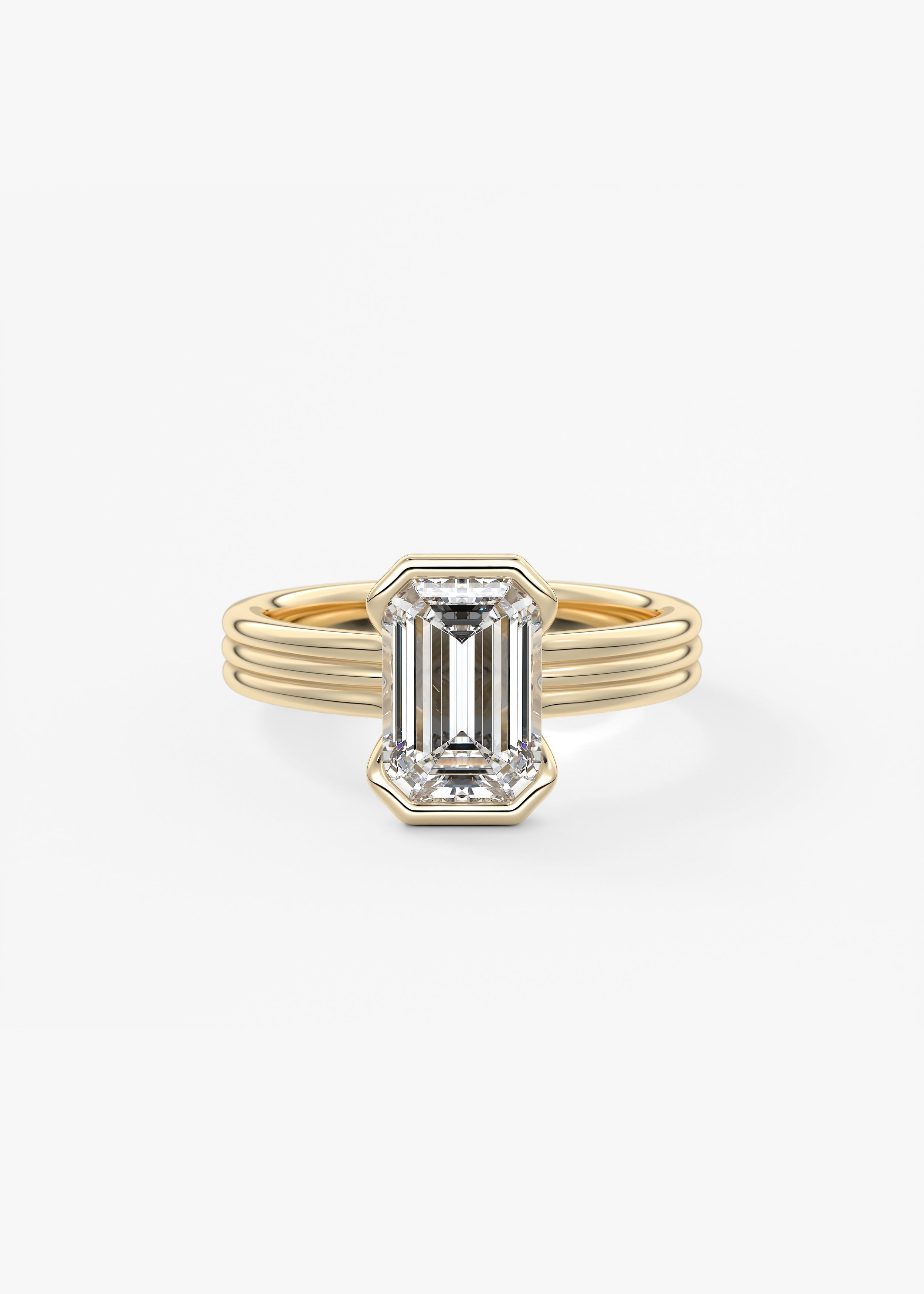 The Echo Half Bezel  engagement in YG metal featuring Emerald cut with Solitaire,Chunky setting