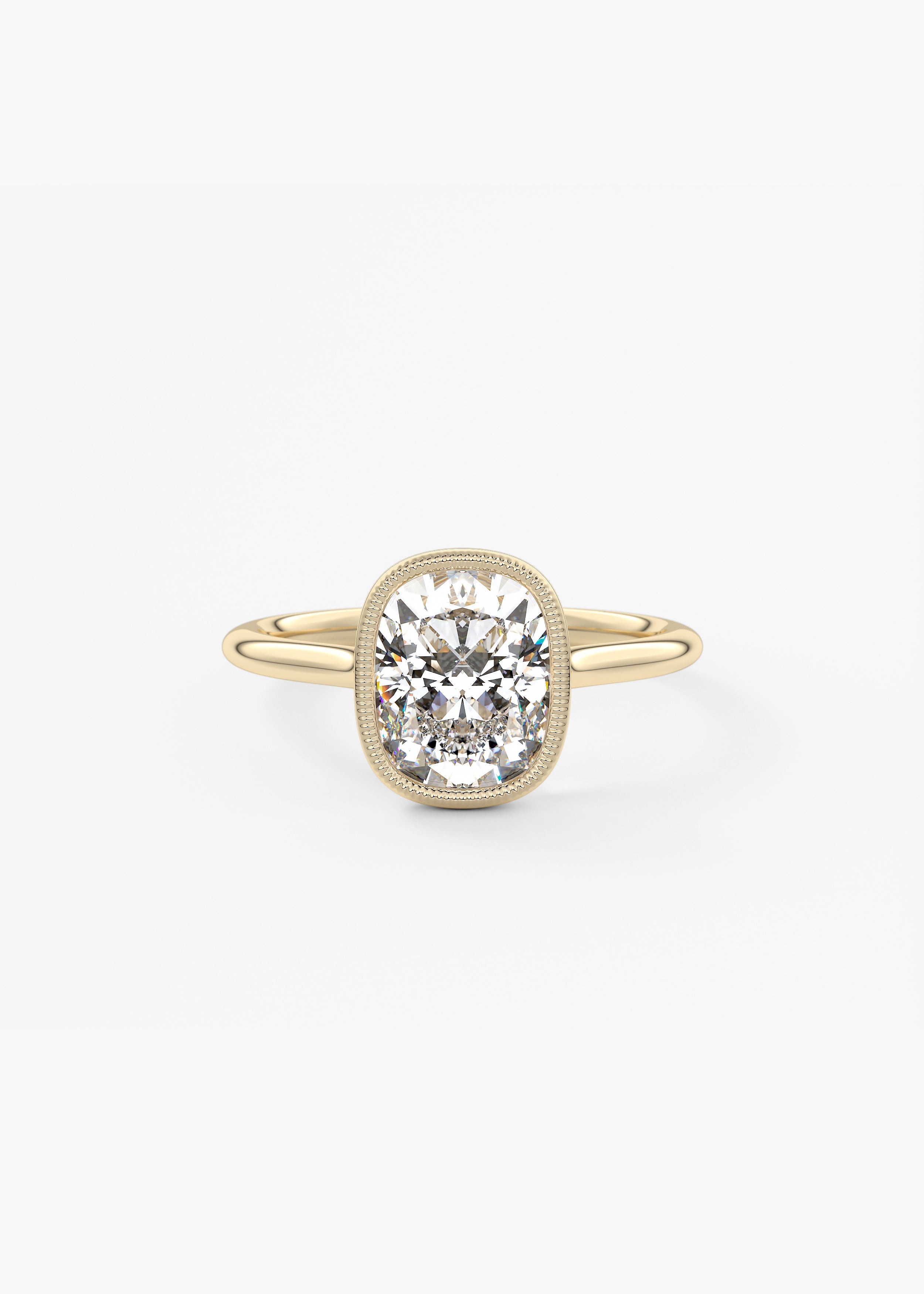 The Milgrain  engagement in YG metal featuring Cushion,Old Mine,Elongated Cushion cut with Solitaire,Bezel,Vintage Inspired setting