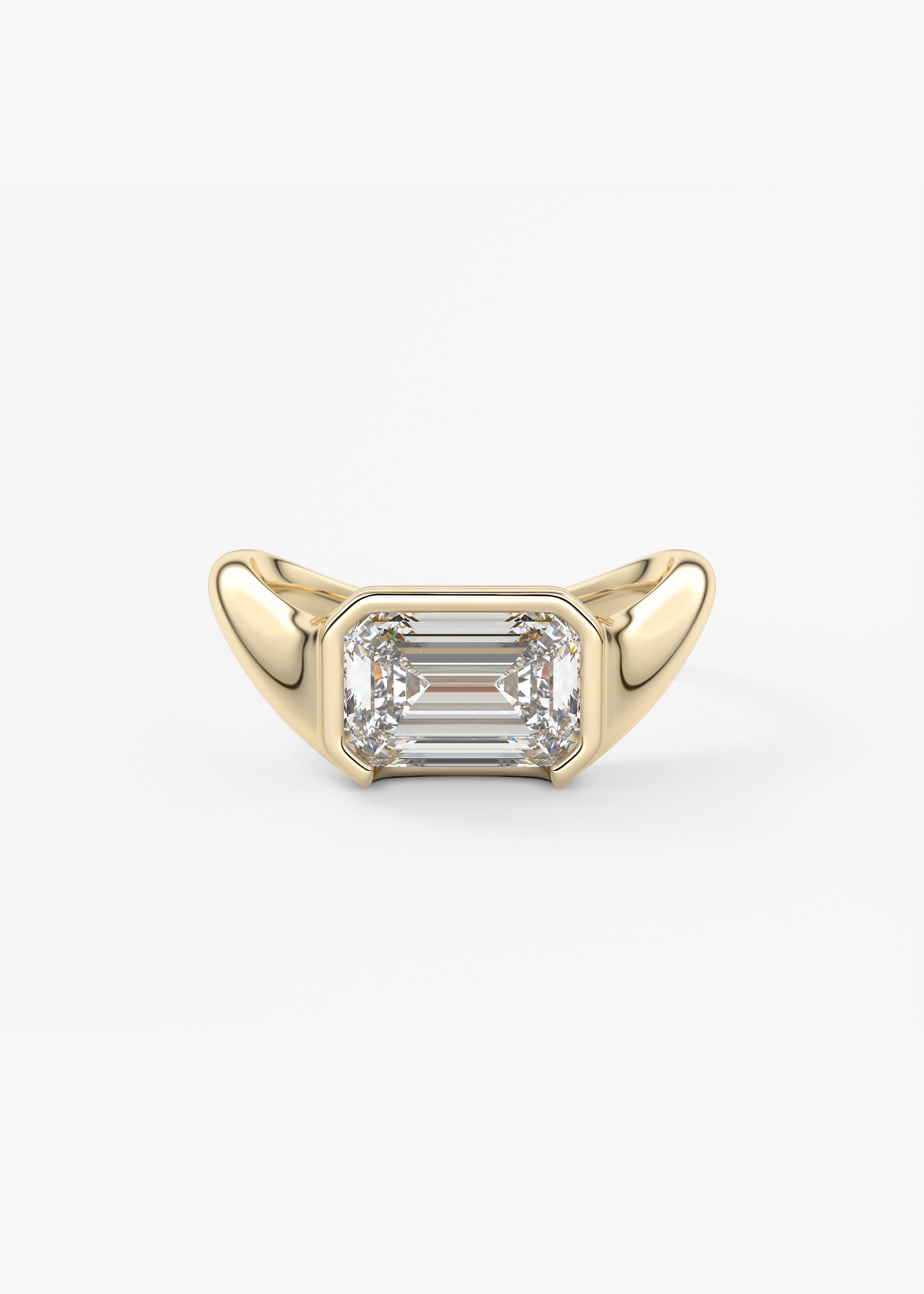 The Ray  engagement in YG metal featuring Emerald,Radiant cut with Solitaire,Half Bezel,Bezel,East West,Chunky setting