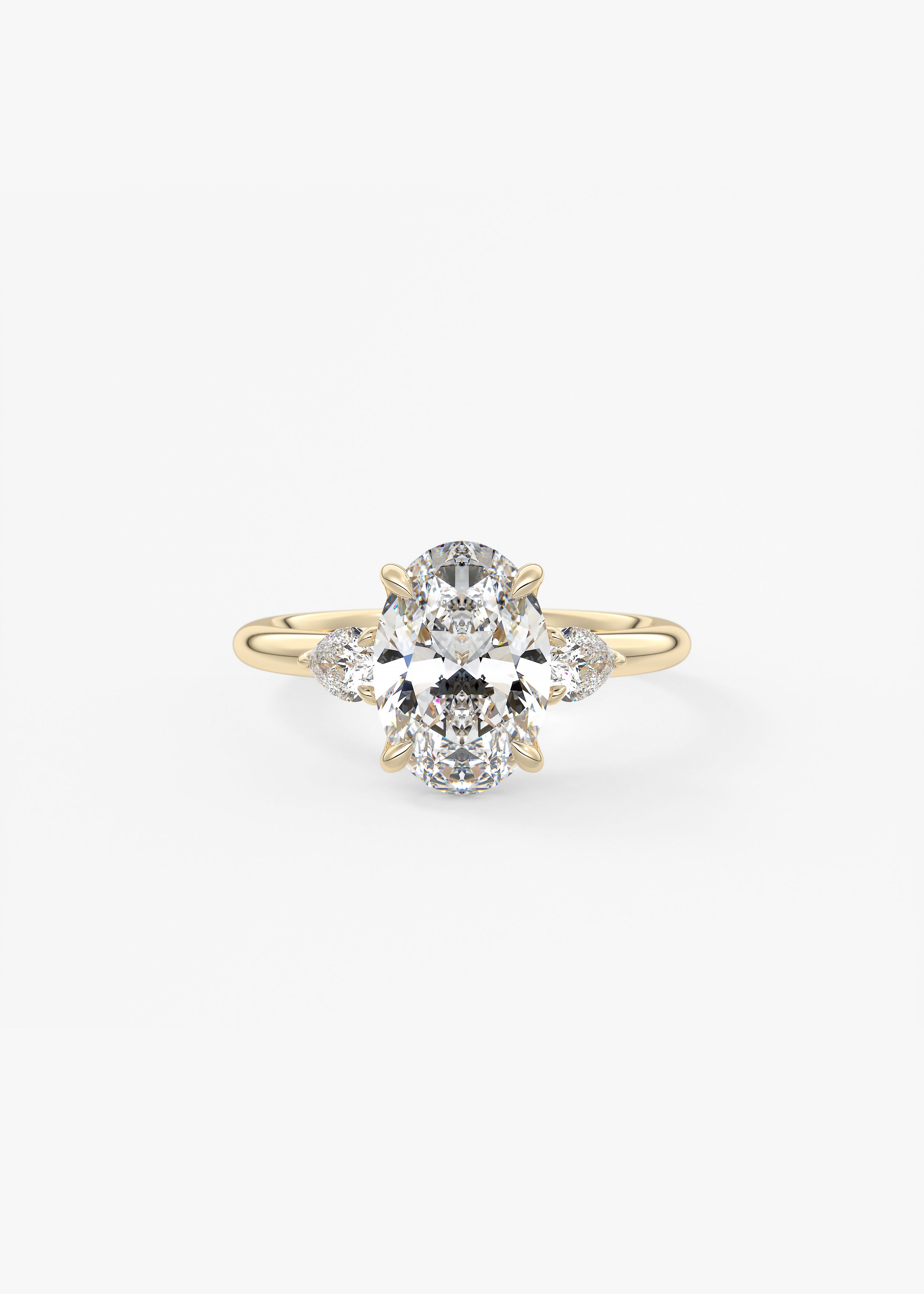 Royale Three Stone  engagement in YG metal featuring Oval cut with Three Stone,Prong setting