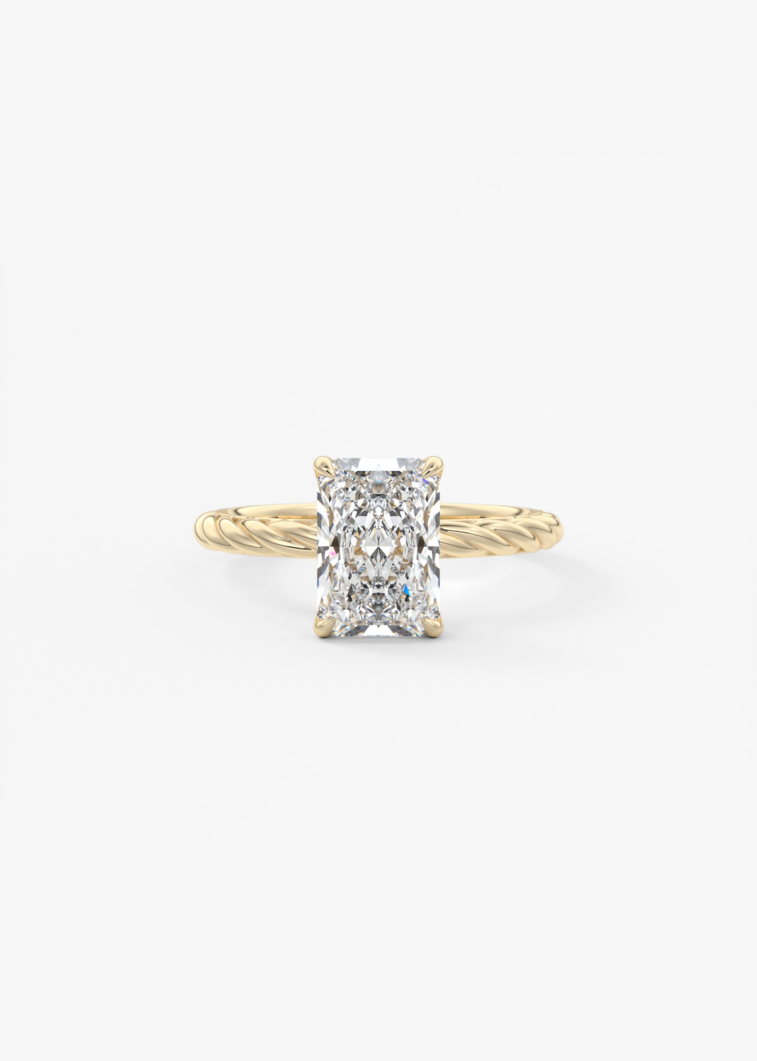 The Rapunzel  engagement in YG metal featuring Radiant cut with Solitaire,Prong,Diamond Details,Hidden Halo,Nature Inspired setting