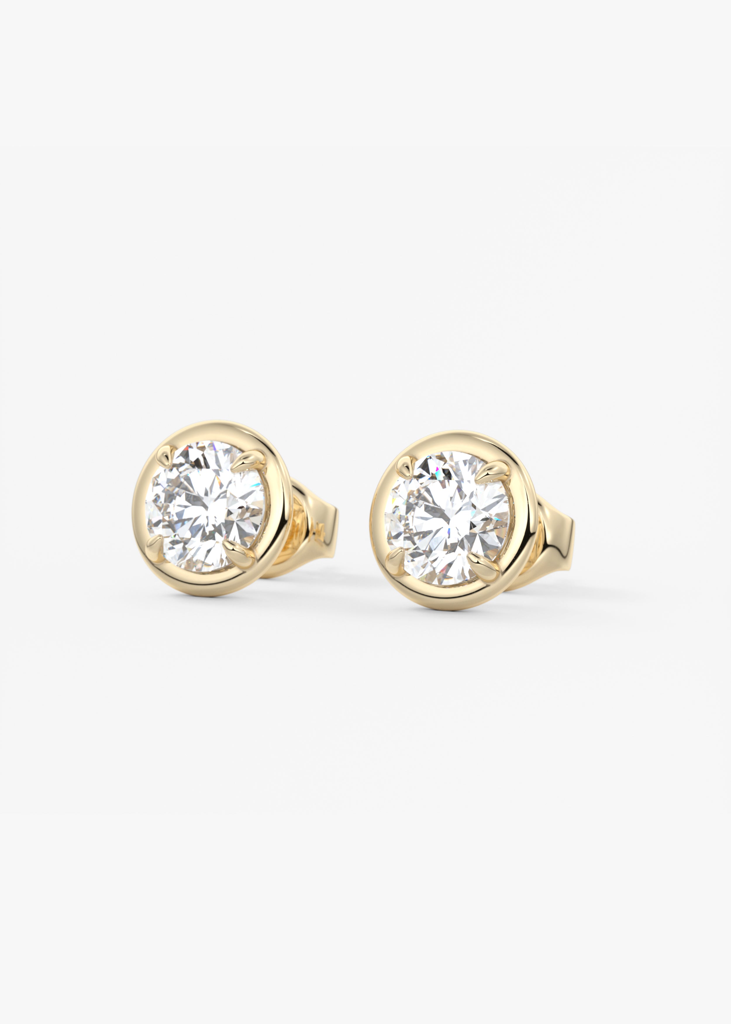Chiclet Studs  stud in YG metal featuring Round,Round Brilliant cut with Prong,Solitaire setting