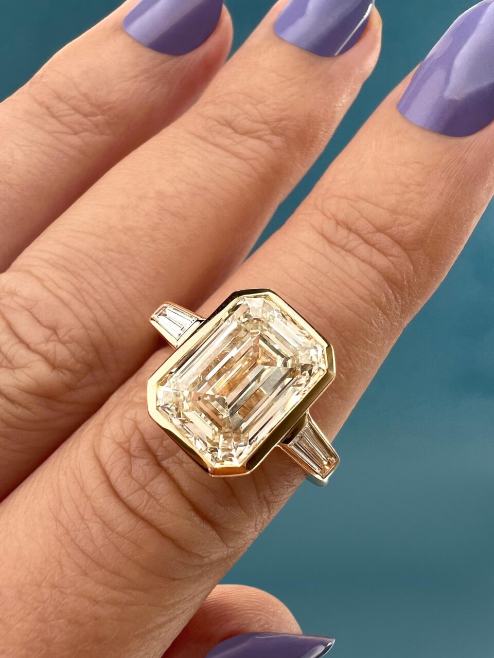 An emerald cut champagne diamond