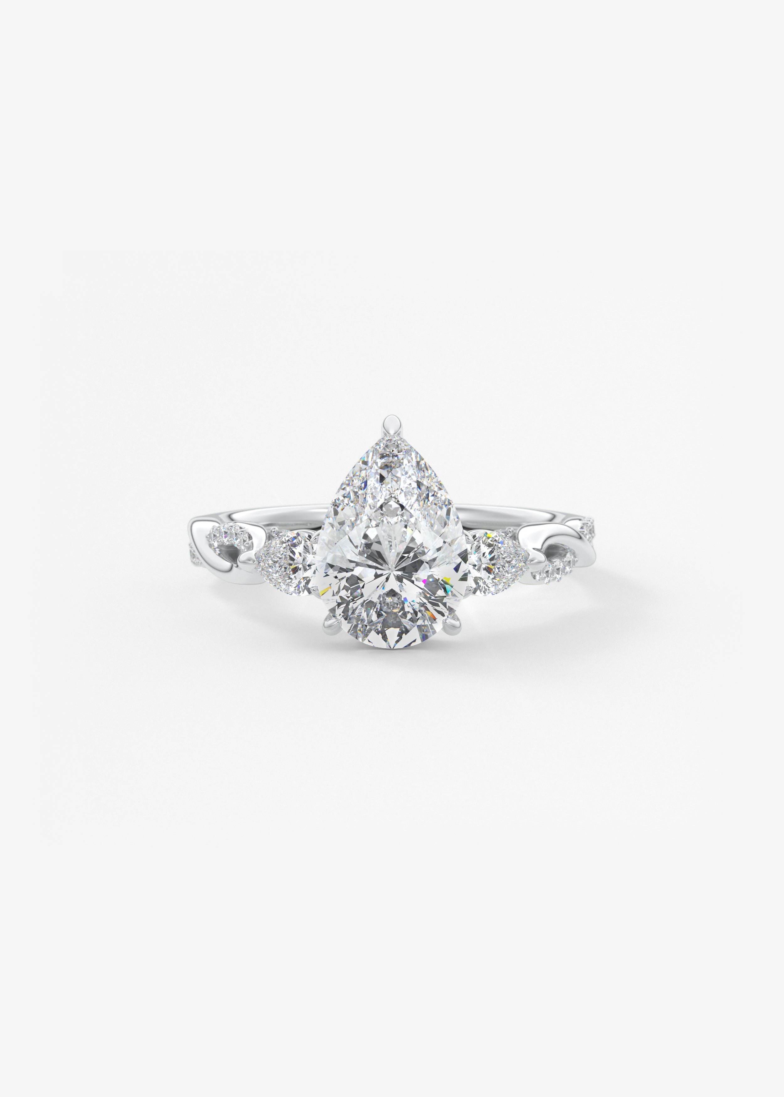The Full Bloom  engagement in WG metal featuring Pear cut with Three Stone,Prong,Pave,Hidden Halo,Vintage Inspired,Split Shank,Nature Inspired setting