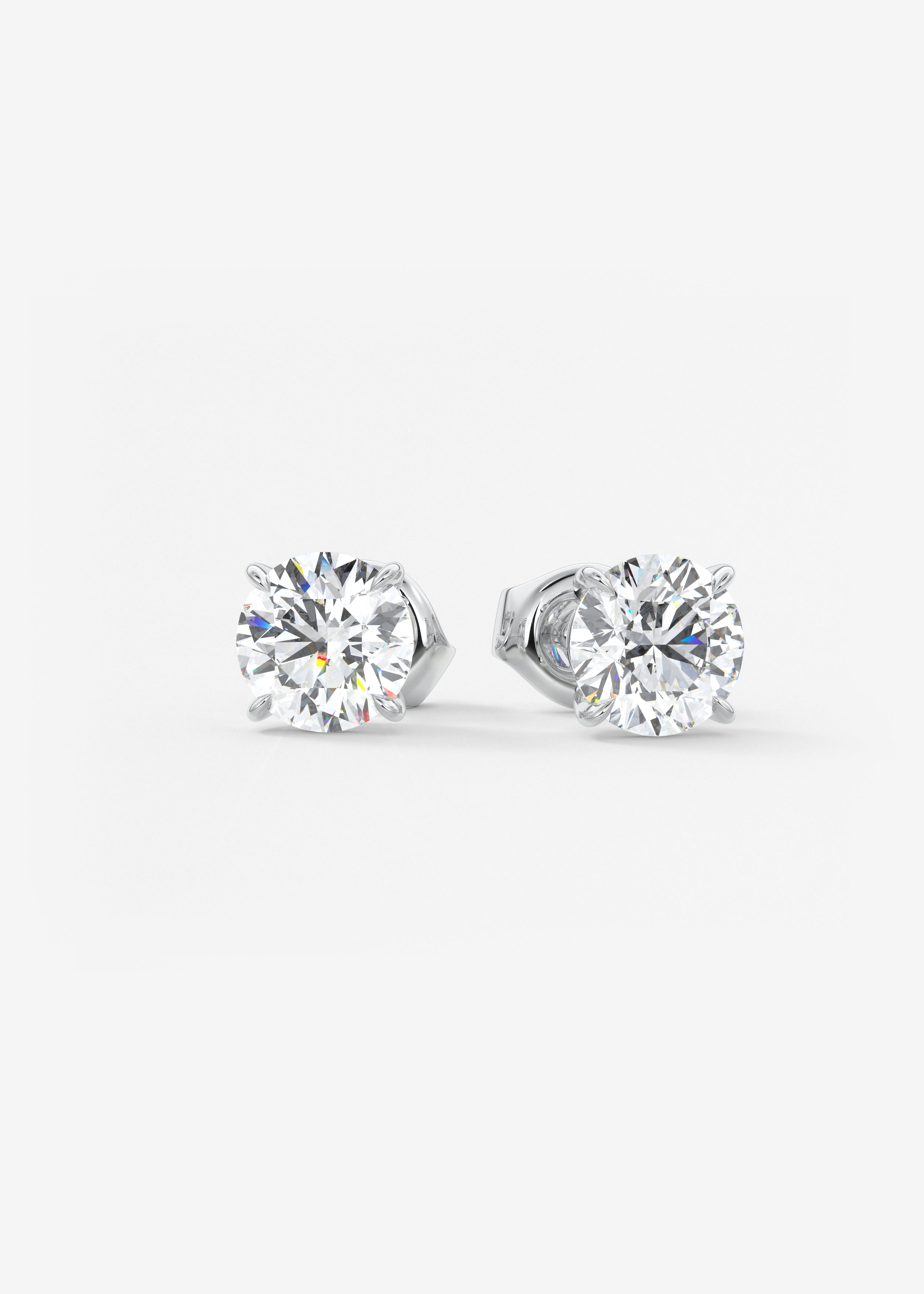 The OG  stud in WG metal featuring Round,Round Brilliant cut with Prong,Solitaire setting