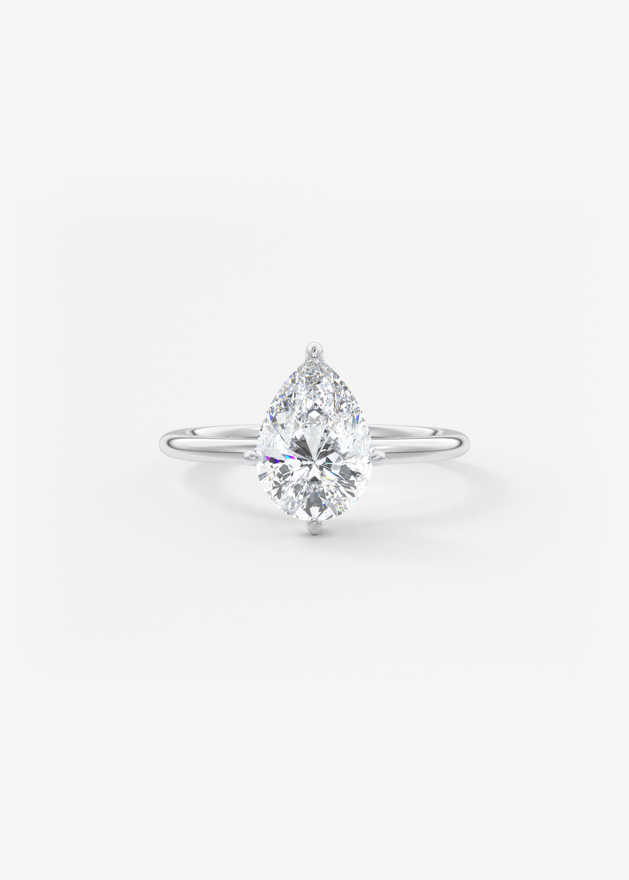 Harper Compass engagement in WG metal featuring Pear cut with Solitaire,Prong setting